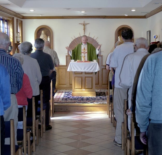 Faithful gathered for Mass in the chapel at Villa Pieta